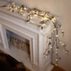 Lighted Snow Dusted Pinecone Garland 6FT 120L